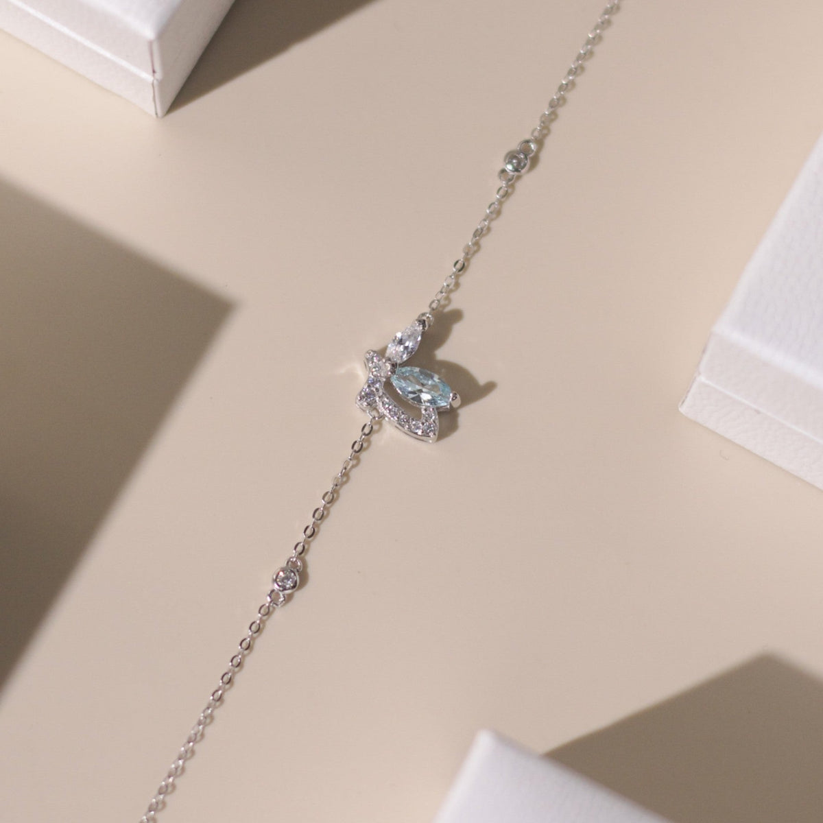 ELOREVA Emmi Butterfly Bracelet with Blue Stone – Platinum Plated 925 Sterling Silver